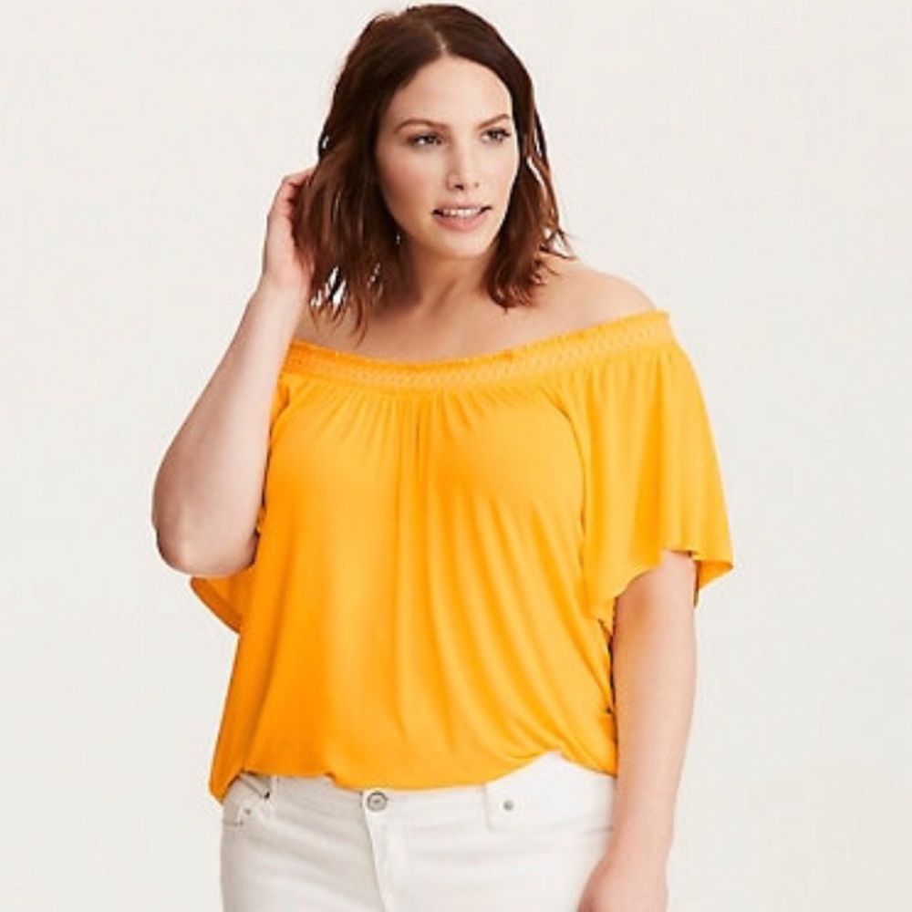 Embroidered Smocked Off Shoulder Top.